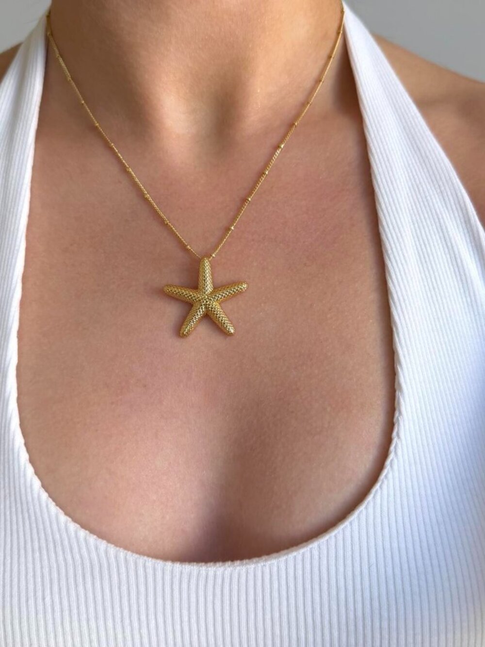 Sku0032 Necklace gold chain + pendant Gold starfish with textured surface